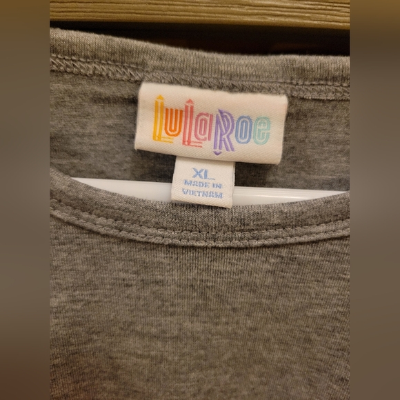 LulaRoe Disney Raglan Top featuring Purple Donald Duck Sleeves - Picture 3 of 5